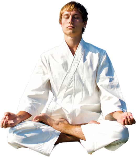 Martial Arts Lessons for Adults in Gilbert AZ - Young Man Thinking and Meditating in White